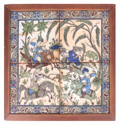 Lot 184 - A 19TH CENTURY PERSIAN QUJAR FOUR TILE PANEL...