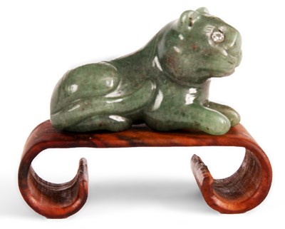 Lot 108 - A carved Jade CAT with jewelled eyes standing...