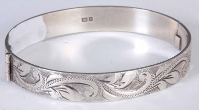 Lot 207 - A 20TH CENTURY SILVER BANGLE Birmingham dated...