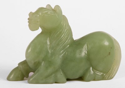 Lot 109 - A Jade carving of a recumbent HORSE 97mm long
