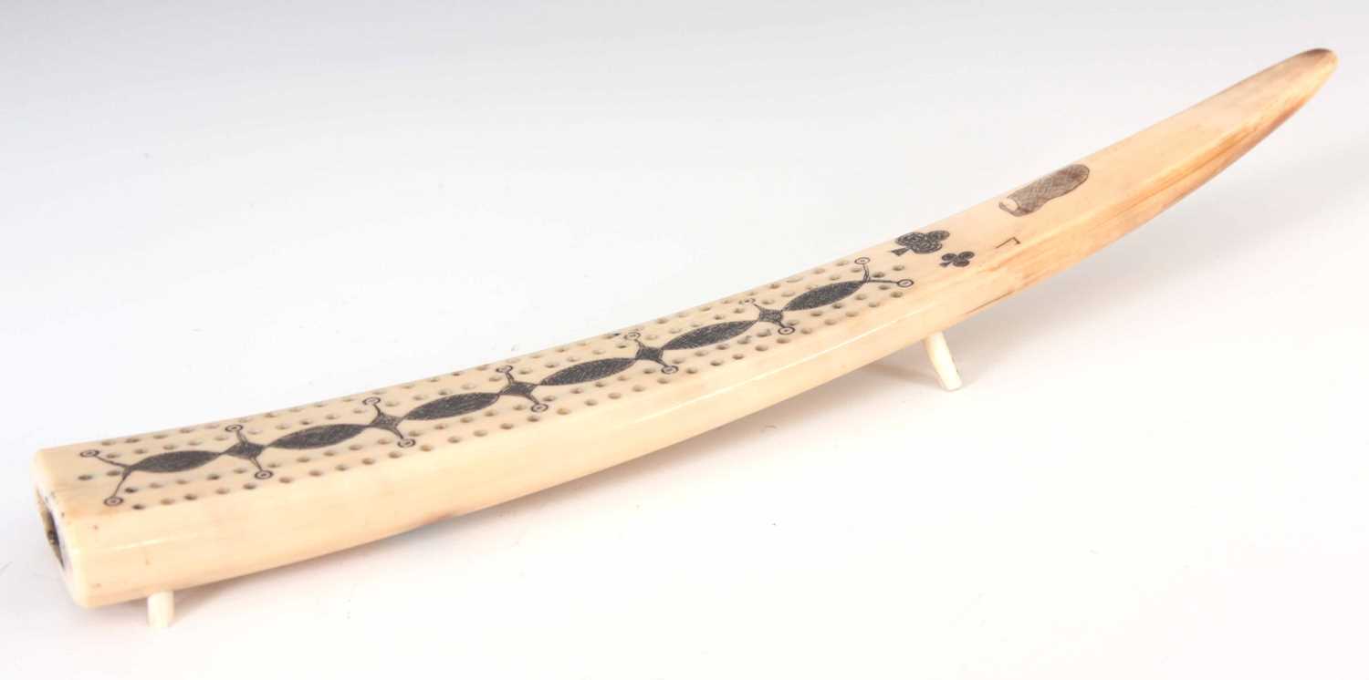 Lot 496 - A 19TH CENTURY SCRIMSHAW WALRUS TUSK