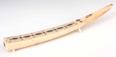 Lot 496 - A 19TH CENTURY SCRIMSHAW WALRUS TUSK CRIBBAGE...