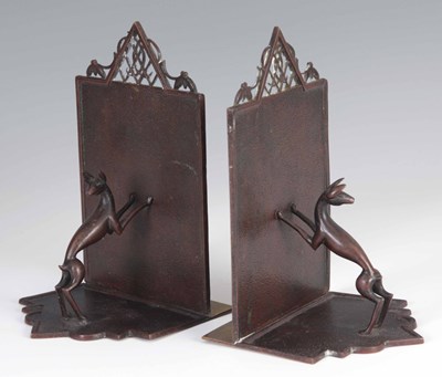 Lot 562 - A PAIR OF 1920s BRONZE BOOKENDS MARKED...