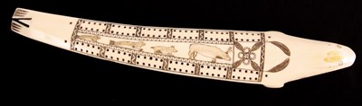 Lot 389 - A 19th Century ESKIMO SEAL'S TUSK CRIBBAGE...