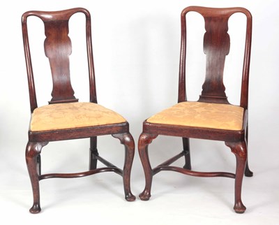 Lot 916 - A PAIR OF EARLY GEORGIAN WALNUT SIDE CHAIRS...