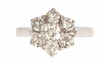 Lot 295 - A LADIES 18CT WHITE GOLD SEVEN STONE DIAMOND...