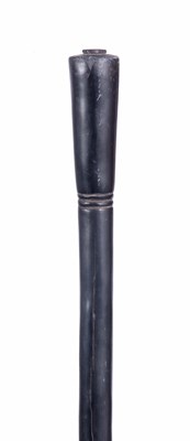 Lot 315 - A 19TH CENTURY EBONY TRIBLE STAFF with carved...