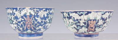 Lot 103 - TWO CHINESE BLUE GROUND PORCELAIN RICE BOWLS...