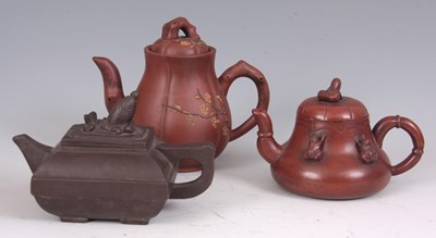 Lot 126 - THREE CHINESE YIXING STYLE TERRACOTA TEAPOTS...