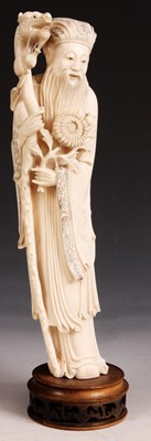 Lot 115 - A carved Ivory standing FIGURE of a SAGE...