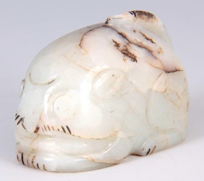 Lot 160 - A CHINESE WHITE JADE SCULPTURE modeled as a...