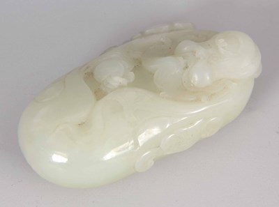 Lot 162 - A CHINESE CARVED JADE PEBBLE formed as a...