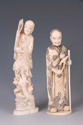 Lot 192 - TWO MEIJI PERIOD JAPANESE IVORY FIGURES the...