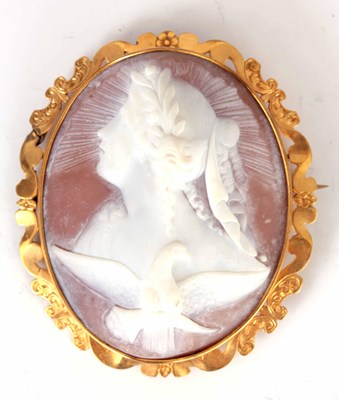 Lot 238 - A 19TH CENTURY OVAL CARVED CAMEO BROOCH...