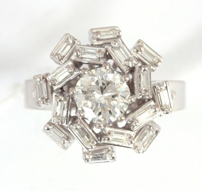 Lot 247 - AN 18K WHITE GOLD DIAMOND CLUSTER RING with...