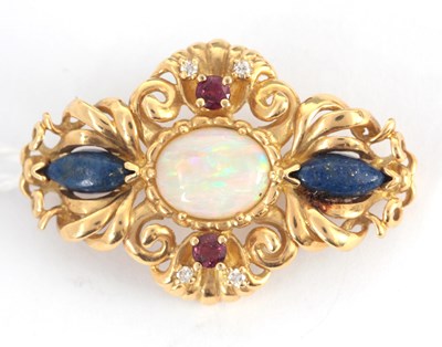 Lot 251 - AN 18K YELLOW GOLD BROOCH set with oval opal...