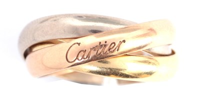 Lot 286 - AN 18K GOLD CARTIER TRINITY RING with three...