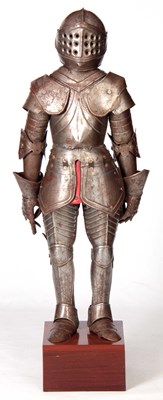 Lot 380 - A MINATURE STEEL SUIT OF ARMOUR mounted on a...