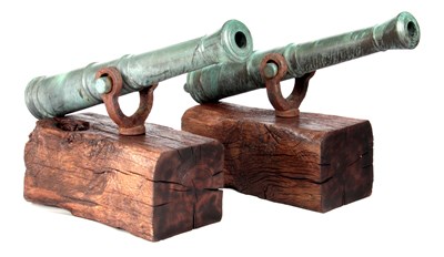 Lot 382 - A RARE PAIR OF GEORGE III BRONZE CANONS of...