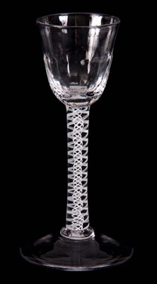 Lot 4 - AN 18TH CENTURY CORDIAL GLASS with ogee fluted...