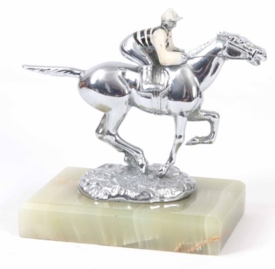 Lot 537 - AN ART DECO STYLE CHROME PLATED CAR MASCOT OF...