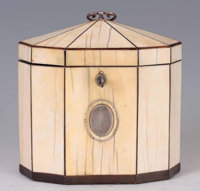 Lot 615 - A GEORGE III IVORY AND EBONY TENT-TOP TEA...