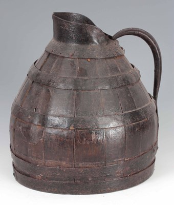 Lot 640 - AN 18th CENTURY COOPERED ALE JUG with ironwork...