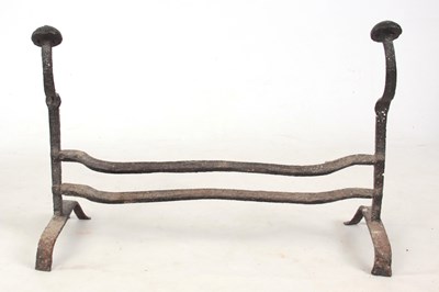 Lot 643 - AN 18TH CENTURY CAST IRON SERPENTINE SHAPED...