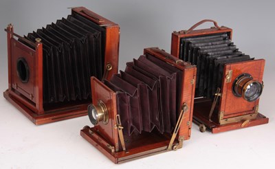 Lot 651 - THREE VINTAGE MAHOGANY PLATE CAMERAS...