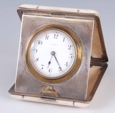 Lot 716 - AN EARLY SILVER AND IVORY TRAVEL CLOCK the...