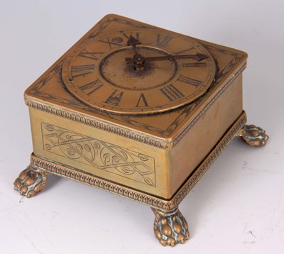 Lot 720 - A NOVELTY BRASS AUSBERG STYLE TABLE CLOCK /...