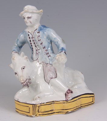 Lot 81 - AN 18TH CENTURY DELFT FIGURE GROUP with...
