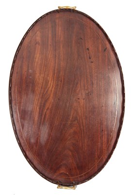 Lot 867 - A GEORGE III FIGURED MAHOGANY OVAL TRAY with...