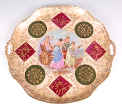 Lot 89 - A VIENNA STYLE SHAPED TWO HANDLED CABARET TRAY...