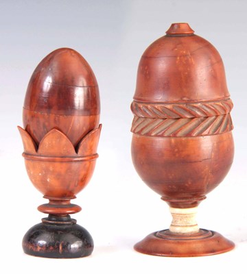 Lot 595 - A 19TH CENTURY TURNED COQUILLA NUT EGG ON...