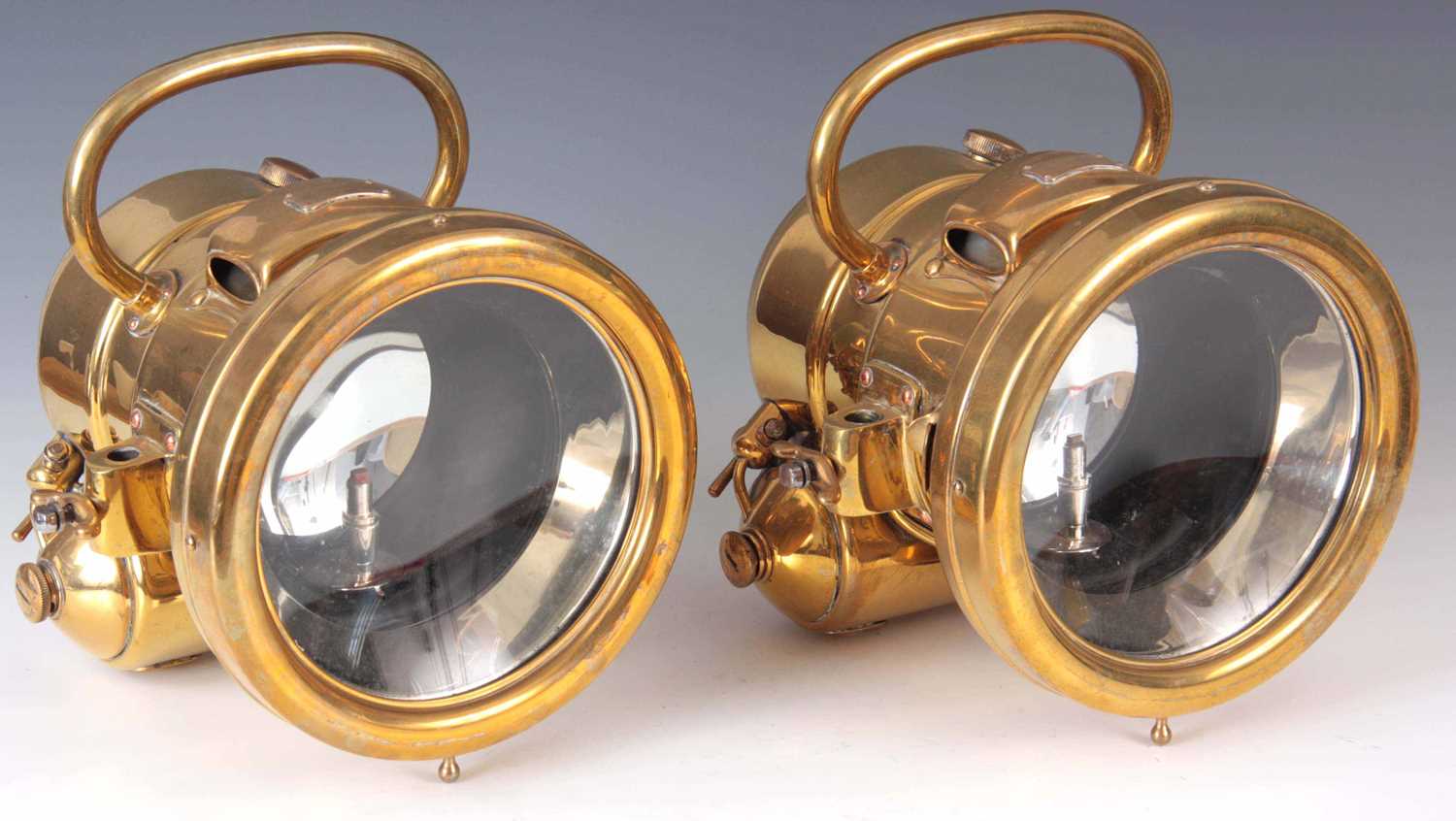 Lot 280 - A LARGE PAIR OF BRASS SELF GENERATING...