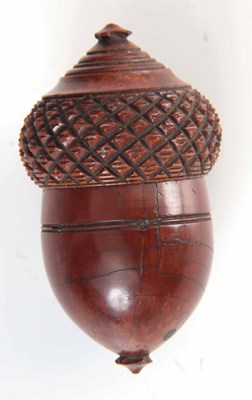 Lot 592 - A 19TH CENTURY TURNED COQUILLA NUT NUTMEG...