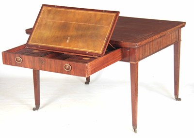 Lot 671 - A GEORGE III FIGURED MAHOGANY RENT TABLE IN...