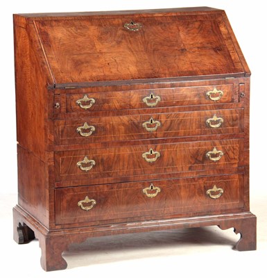 Lot 672 - A QUEEN ANNE FIGURED WALNUT BUREAU with...