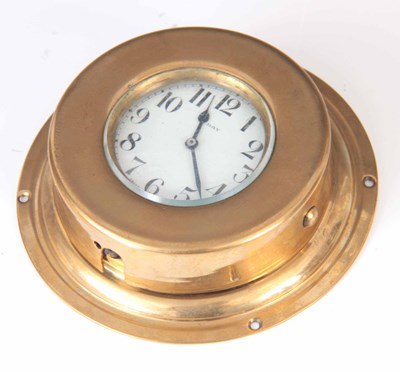 Lot 306 - AN EARLY 20TH CENTURY CAR CLOCK the circular...