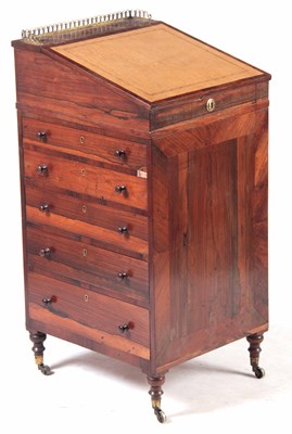 Lot 720 - A REGENCY ROSEWOOD DAVENPORT with angled...