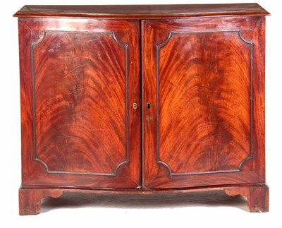 Lot 656 - A GEORGE III FLAMED MAHOGANY SERPENTINE...