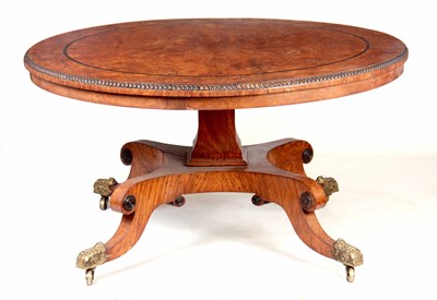 Lot 662 - A GOOD REGENCY POLLARD OAK CENTRE TABLE having...