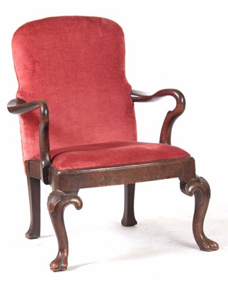 Lot 665 - A QUEEN ANNE WALNUT UPHOLSTERED ARMCHAIR OF...