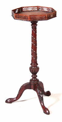 Lot 696 - A LATE GEORGIAN MAHOGANY CARVED WINE TABLE...