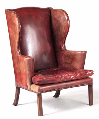 Lot 708 - A LATE 19TH CENTURY RED LEATHER WING-BACK...