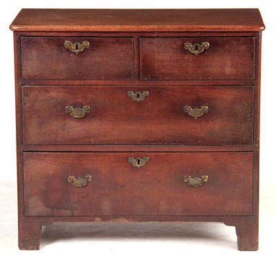 Lot 718 - A GEORGE II MAHOGANY CHEST OF DRAWERS with...