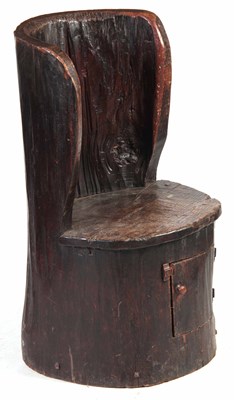 Lot 725 - AN EARLY OAK DUG OUT SEAT with hinged door to...