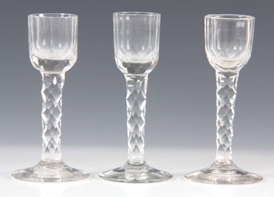 Lot 4 - A SET OF THREE 18TH CENTURY CORDIAL GLASSES...