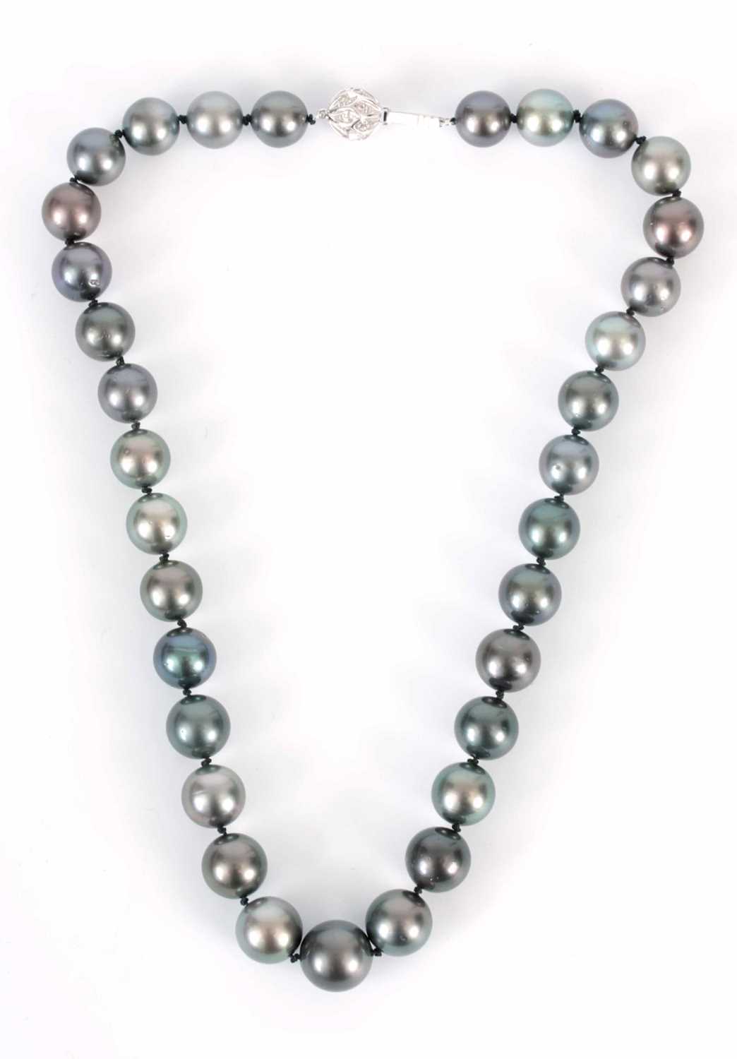 Lot 171 - A FINE BLACK PEARL NECKLACE with a diamond set...